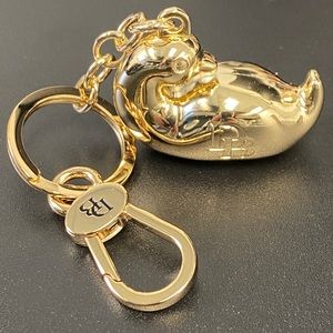 Dooney and Burke golden duck fob keychain charm